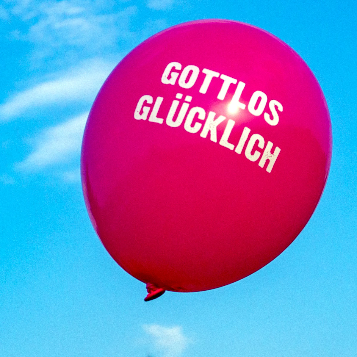 GOTTLOS GLÜCKLICH